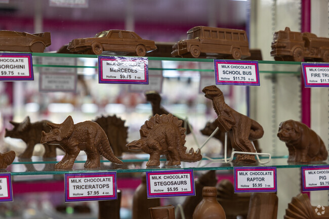 Find dinosaur replicas molded out of milk chocolate near Franklin at Gene and Boots Candies.
