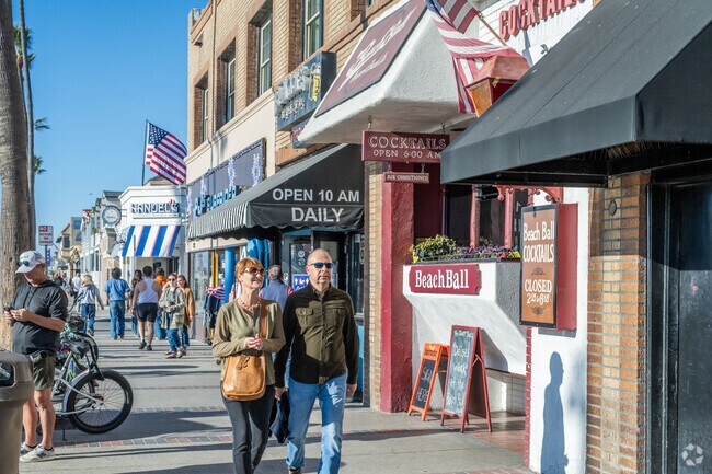 Several bars and restaurants lined up in Central Newport Beach have views of the ocean.