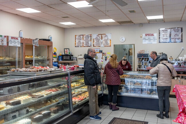Artuso & Sons Bakery delights Thornwood with traditional cookies and sweet treats.