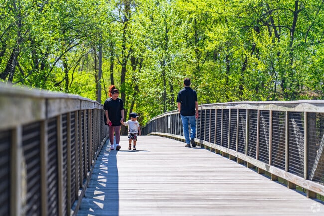 The Mary T. Early Footbridge, a connector of the Charles River Greenway, is a picturesque part of Bleachery where locals can walk across the Charles River.