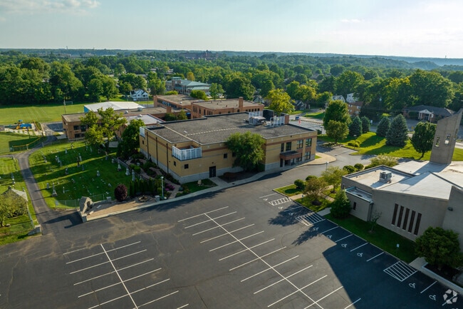 Aerial of school campus in Delhi Hills neighborhood.