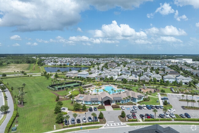 Residents take advantage of the pool, playground, and tennis courts at the Storey Park neighborhood clubhouse.
