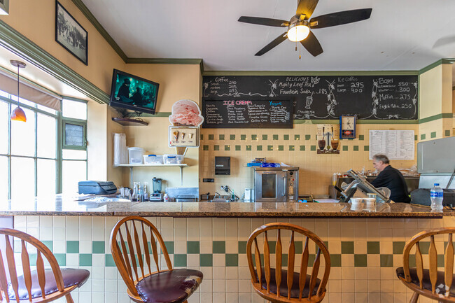 In Dover the seating area at the Dover Café Deli has green and white tiling at the bar.