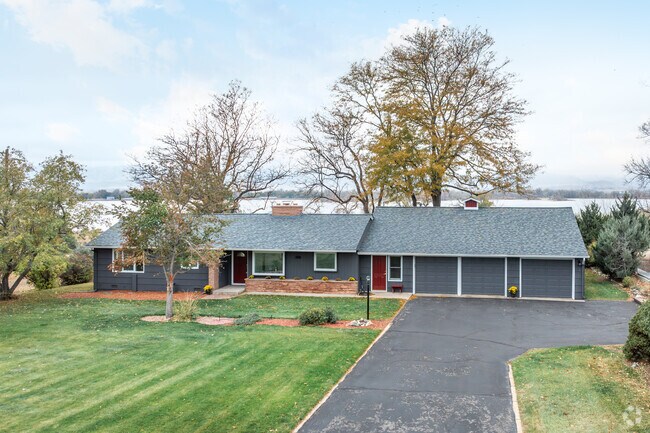 A ranch home with lake views sits in the Giddings neighborhood.
