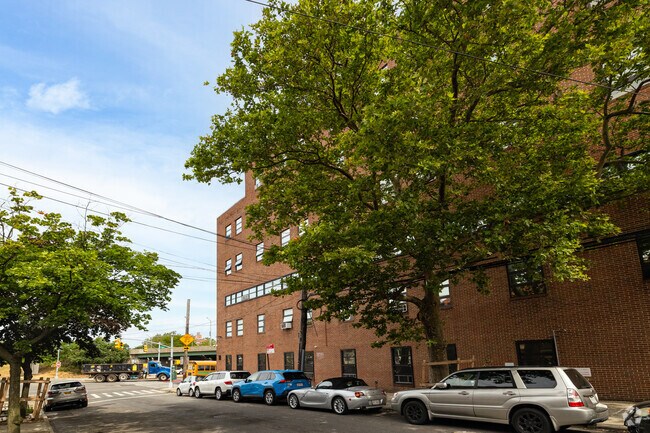 Part of the massive Jewish Institute of Queens, New York is on a residential street.