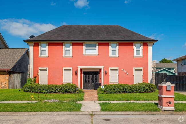 Some homes in the West Lake Forest neighborhood offer bright-colored exteriors.