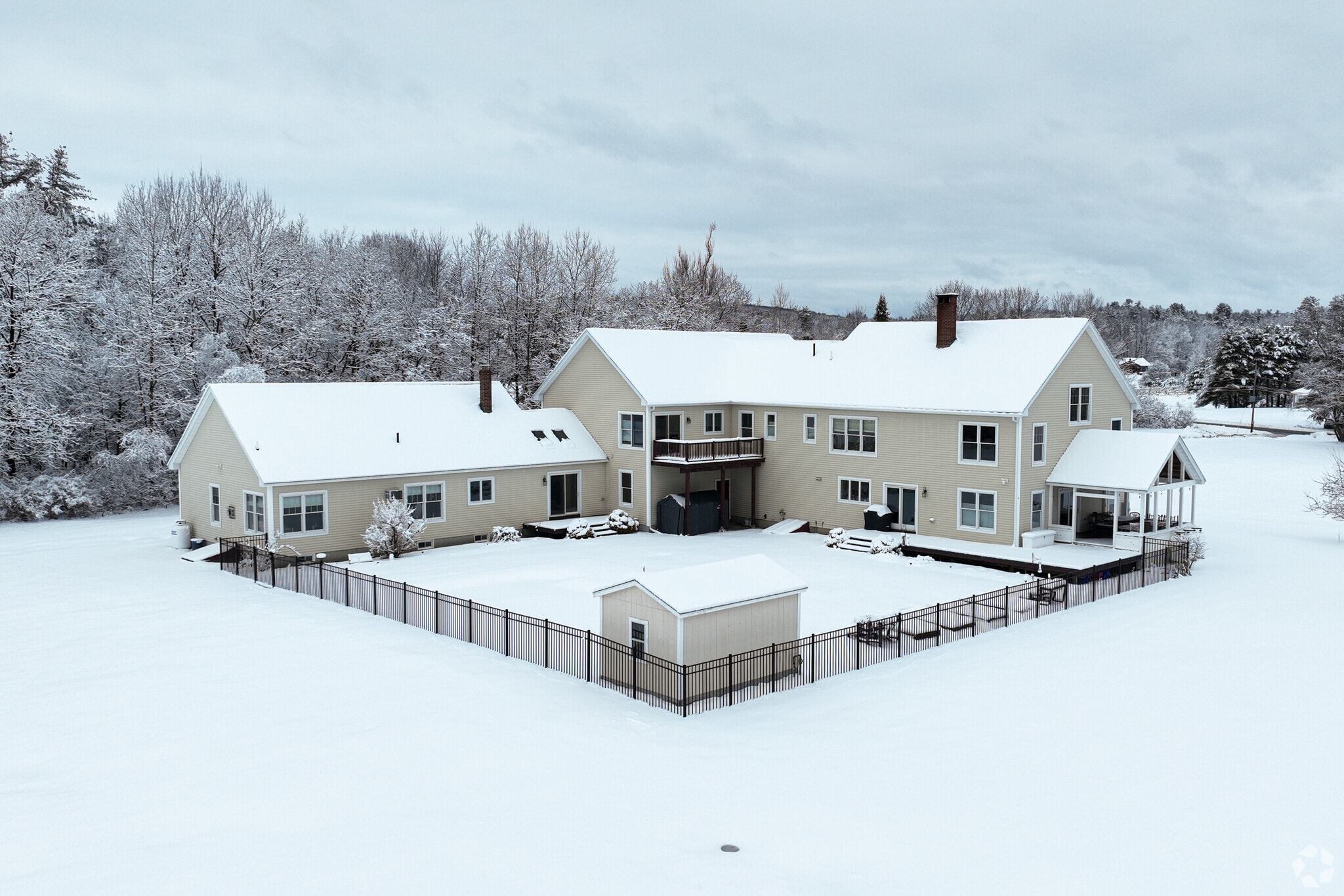 This farmhouse is tucked in the wintery woods in Pownal.