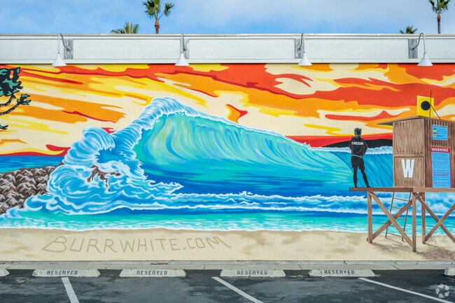 A mural attributed to fallen Ben Carlson can be found near Central Newport Beach.