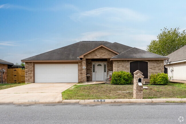 Single story brick style home adjacent to Robert G. Balli Park.