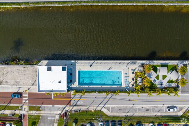 Tope Down View Of Town of Medley Pool and Picnic and BBQ Area on Canal.