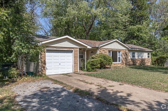 Single-family homes in the Asbell neighborhood feature attached garages.
