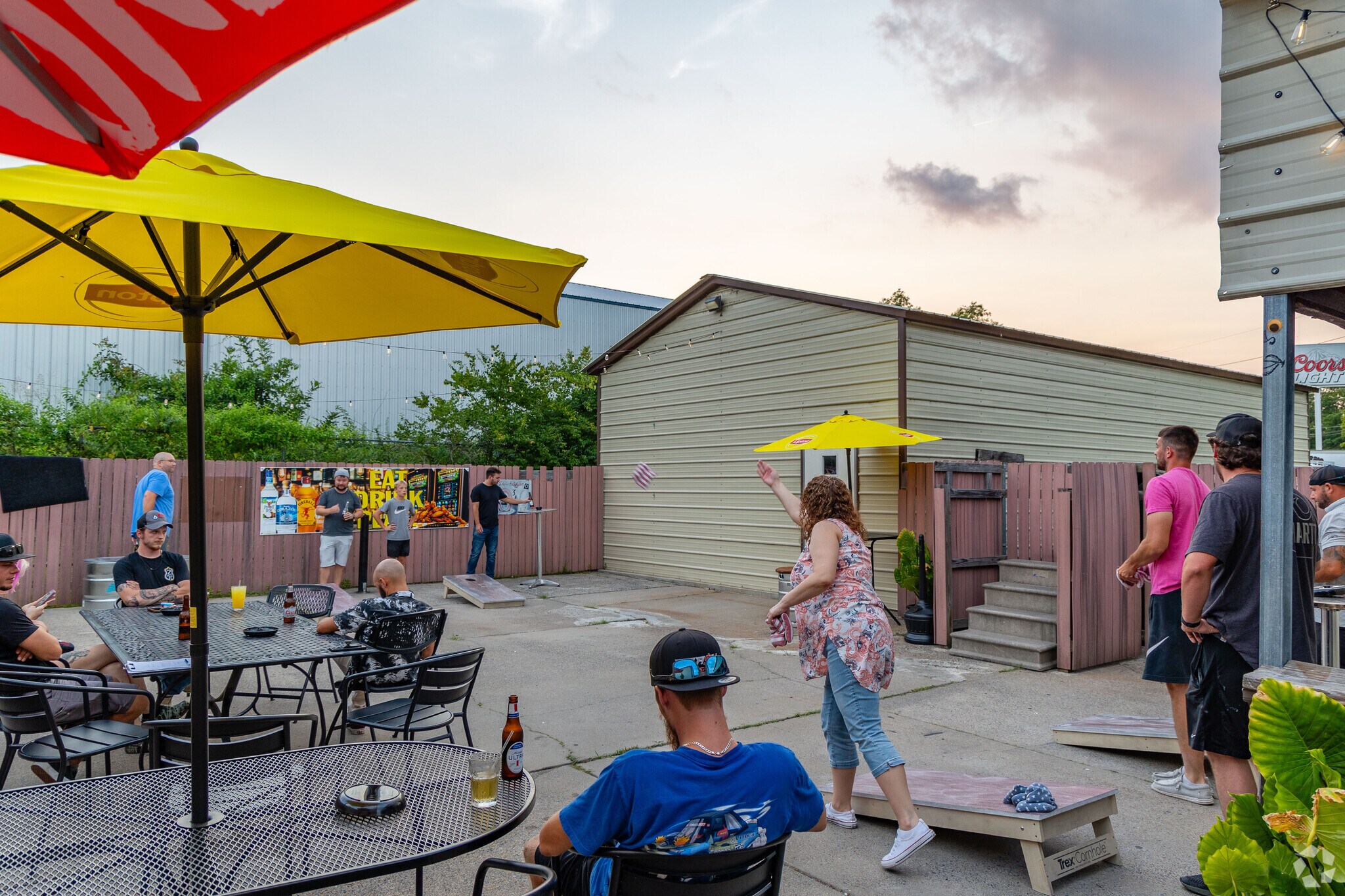 Friends can gather at KC's Bar & Grill in Conrad Heights for cornhole and good food.