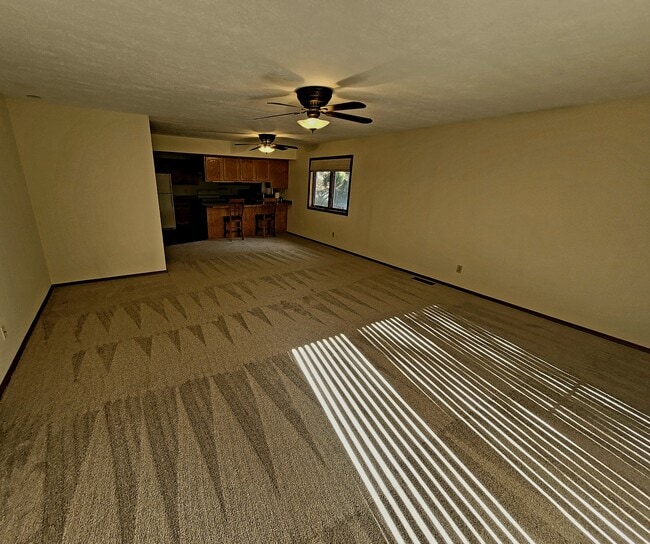 Living room facing kitchen