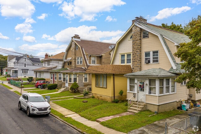 Collingdale duplexes provide small front yards and plenty of street parking.