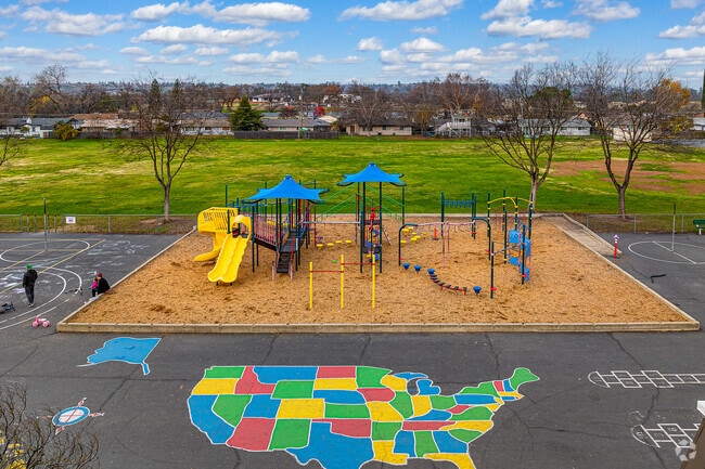 Family enjoys the outdoors at Greenhills Elementary School on the weekend.