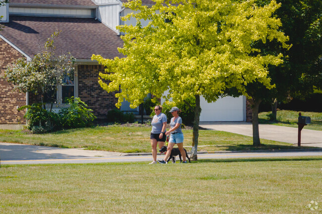 Many residents of Western Hills enjoy walking through the neighborhood on a sunny afternoon.