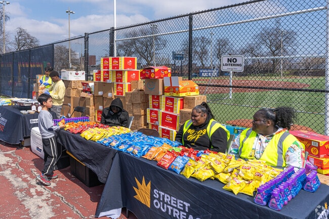 Snacks are offered at the Easter Egg Hunt in Garfield Park.