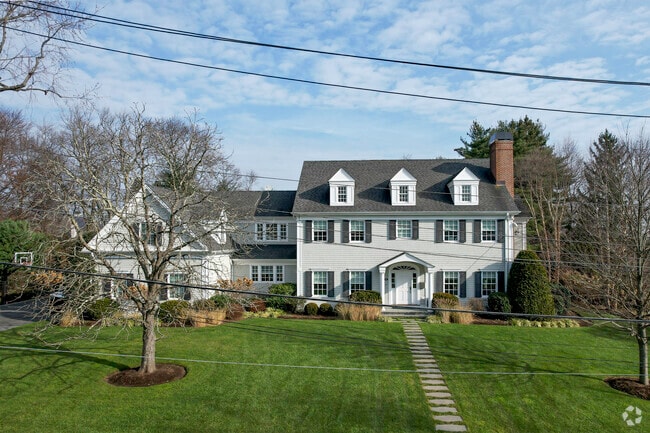 Quaker Ridge has some newer homes like this Princess Revival.