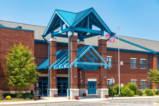 Elms Elementary School has a bright blue front in Jackson Township NJ.