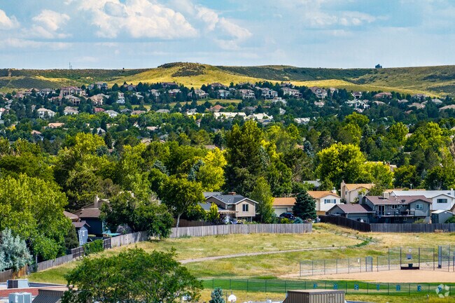 Acres Green is a suburban neighborhood conveniently located near several parks and shops.