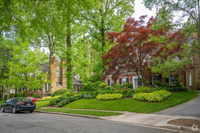 A couple of Cape Cod style homes on shady Primrose Dr NW in Colonial Village.