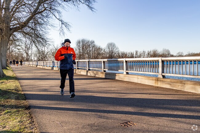 Morningside residents get exercise as they run around the Reservoir trail in Highland Park.