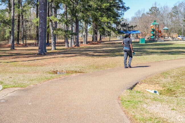 Brookhaven City Park boasts open green spaces ideal for picnics and outdoor activities.