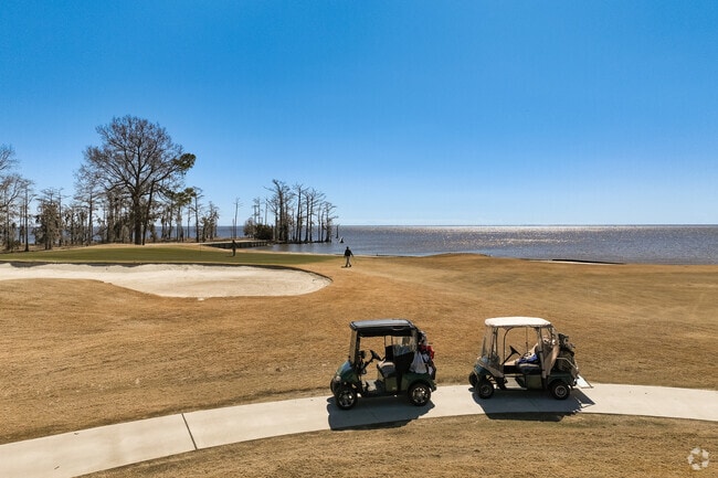 The waterfront golf course at Albemarle Plantation delivers scenic views and a challenging game.
