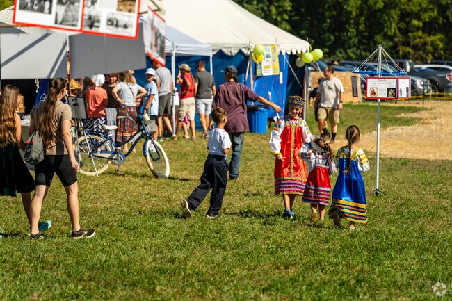 Kids dress in traditional Slavic clothing during Russian Festival in Lima Township.