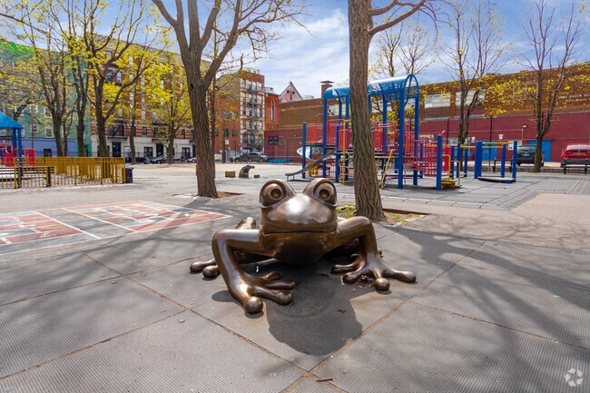 Anna Silver Elementary shines brightly with its frog mascot in the Lower East Side community.