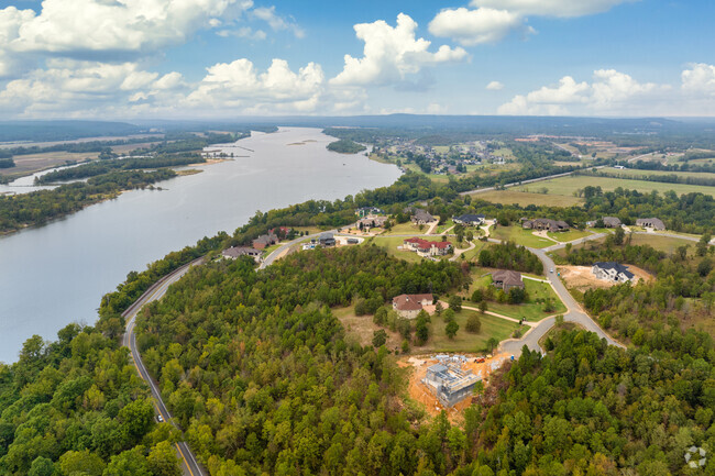 Highway 365 and the Arkansas River wind by the Mountain Crest Estates.