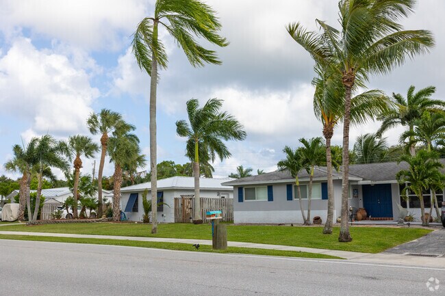 Traditional single-family homes in the Tequesta neighborhood.