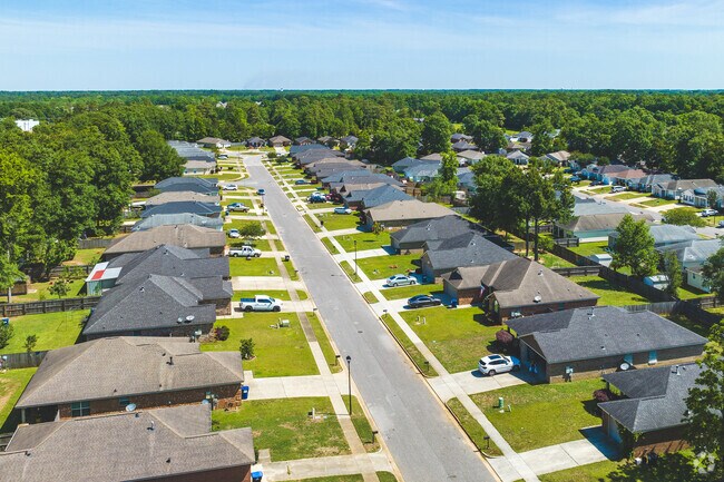 Tucked away in West Mobile, the community of Warwick invites you to explore its wooded areas.