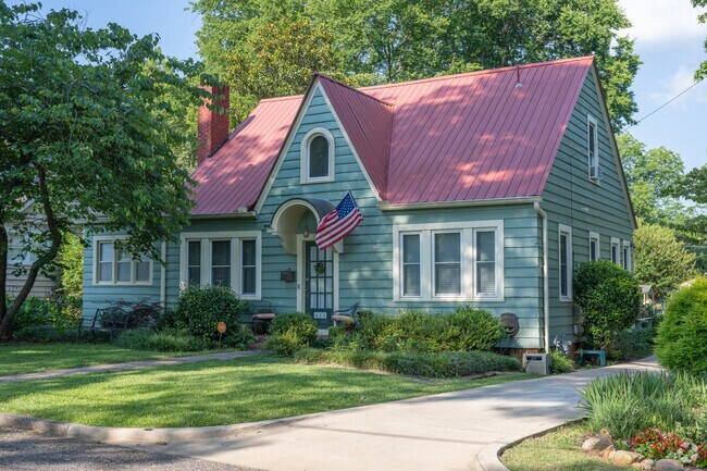 Anniston homes sometimes showcase bold roofs and distinctive window designs.