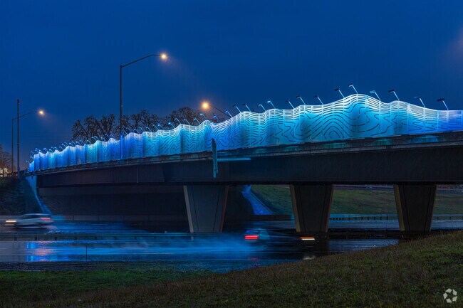 The Bridge of Land & Sky art installation adorns the Brookwood Parkway bridge across Hwy 26.