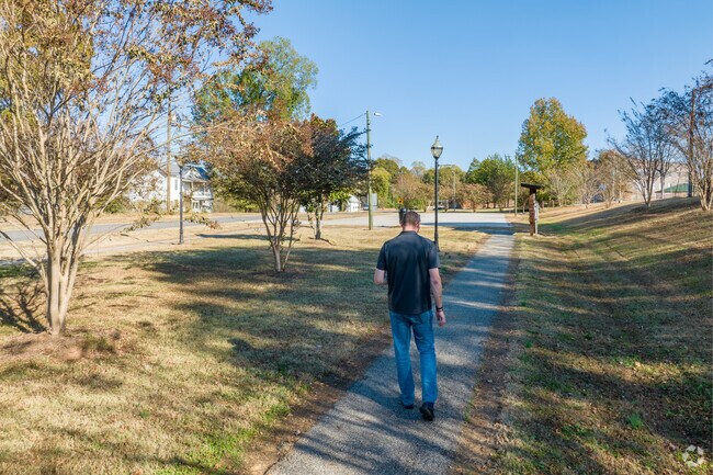 Rainey Park near downtown allows for residents to walk along the small trail.