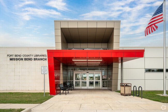 Mission Bend's library exterior echoes community warmth.