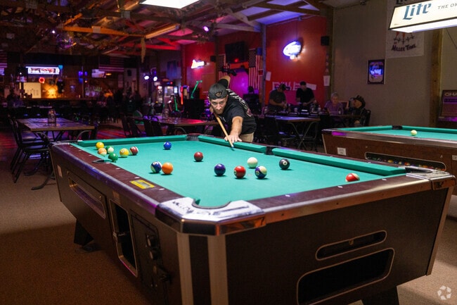 A fun game of pool is a popular past time at CJ's Sports Bar in Bloomingdale.