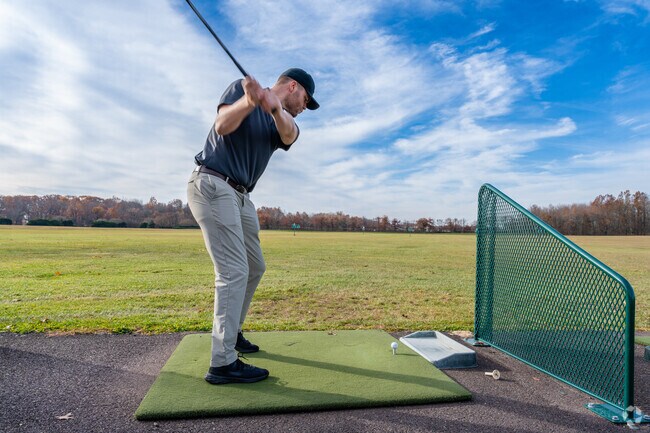 The seasonal Driving Range is open to the public with a golf ball dispenser.
