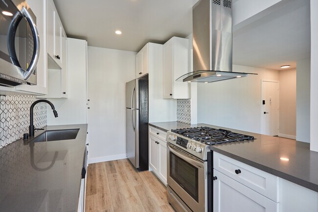Large Kitchen with Stainless Steel Appliance Package