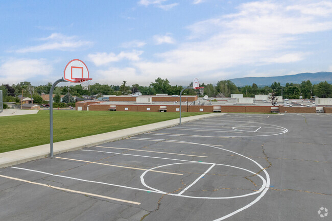 Basketball courts under a blue sky at Ridgecrest Elementary School.