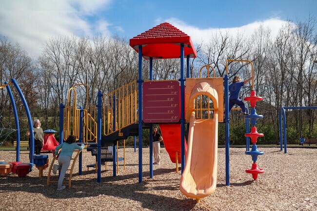Children are enjoying a warm fall day at Oxford Park in Southeast Scott County.
