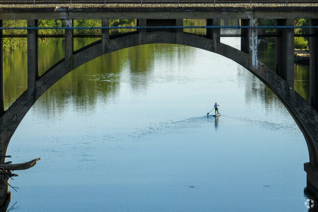 Glide atop the gentle ripples of the Rappahannock River on a paddleboard in Riverside.