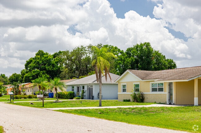 Ranch style homes with varying designs line the streets in Fort Myers Shores.