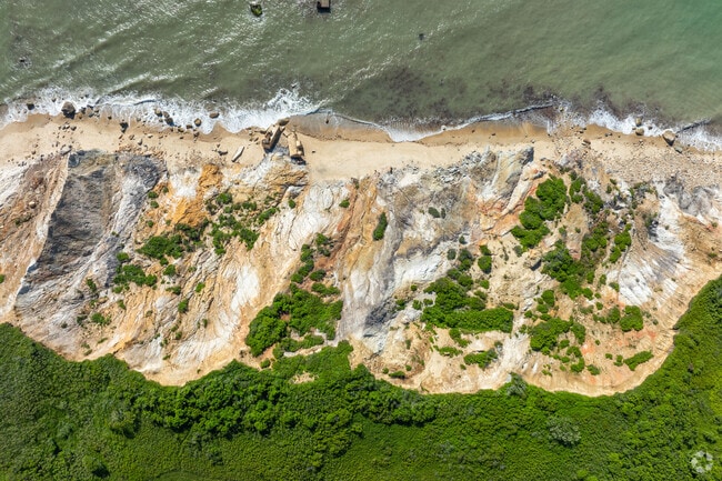 The relenting Atlantic Ocean slowly eroded the Aquinnah cliffs every day.