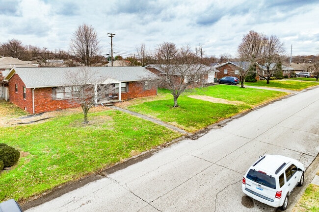 In warmer months the streets are filled with trees and bright flowers found on lawns.