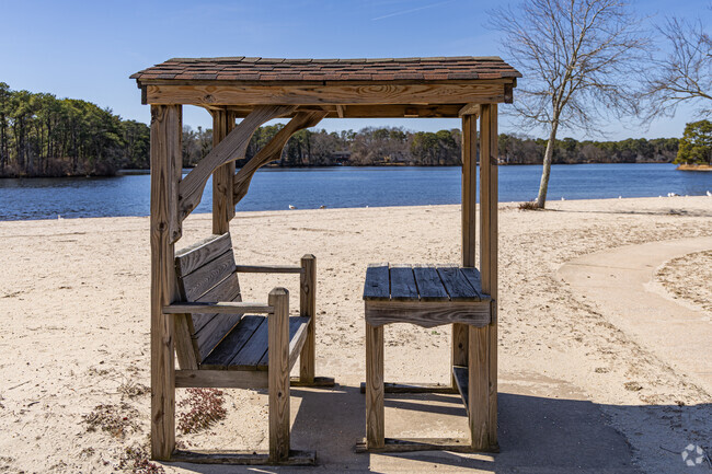 Pine Lake Park provides bathing beaches equipped with restrooms on each side of the lake, enhancing the convenience for guests.