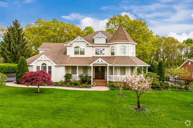 Beautiful victorian homes with wrap around porches are common in Commack.