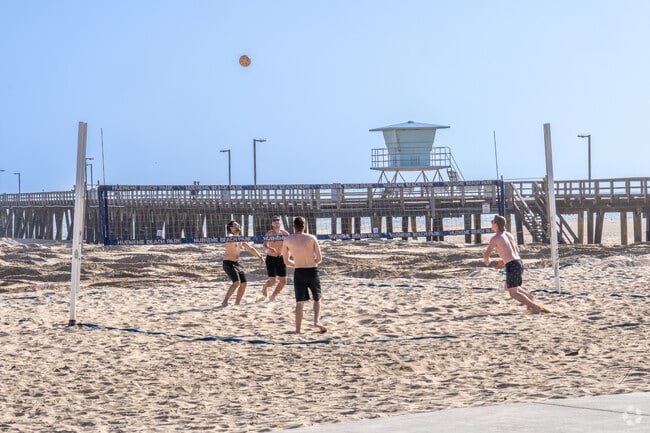 Locals and tourist alike enjoy playing beach volleyball at Port Huenueme Beach.