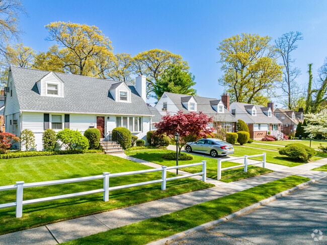 A quiet street full of cute Cape Cods in Roslyn Heights.